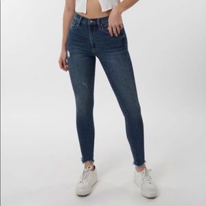 Garage ultra high rise skinny jeans.